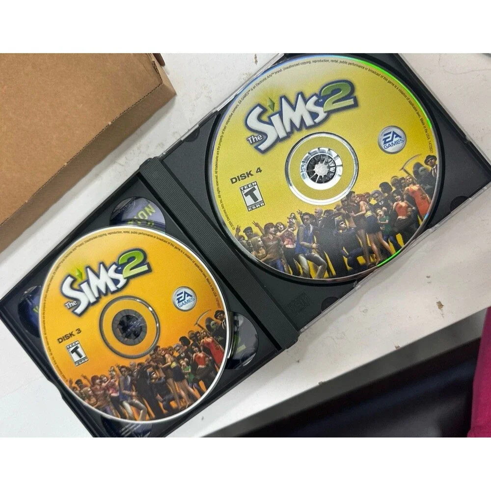 The Sims 2 PC CD-ROM Complete 4 Disc Set w/ Manual EA Games Tested Read